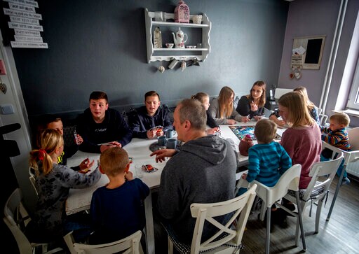 German Mother of 11 Kids Fights Virus with Discipline, Love