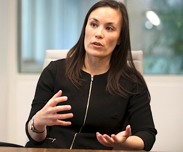 Texas Democrat Gina Ortiz Jones gestures as she speaks to the media