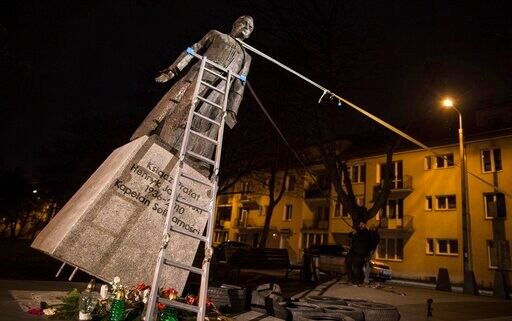 Workers Restore Polish Priest's Statue Despite Abuse Claims