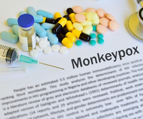 monkeypox information, various medications, vial, syringe
