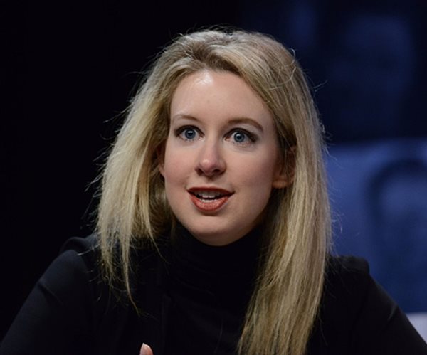 Theranos Founder, Ex-President Charged in Criminal Scheme 