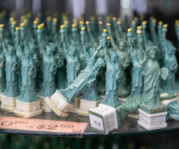 a statue of liberty souvenir is turned over