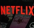 DOJ Probes Netflix Practices in Warner Merger Review