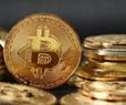 Bitcoin Slides to $62,907 on Tariff Turmoil, Iran Tensions