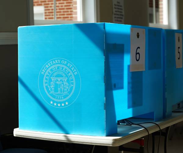 Greene Predicts GOP 'Slaughter' in Midterms Amid Trump Break