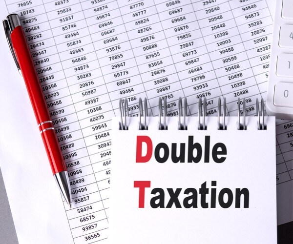 Mitchener: Congress Must End Double Taxation for Americans Abroad