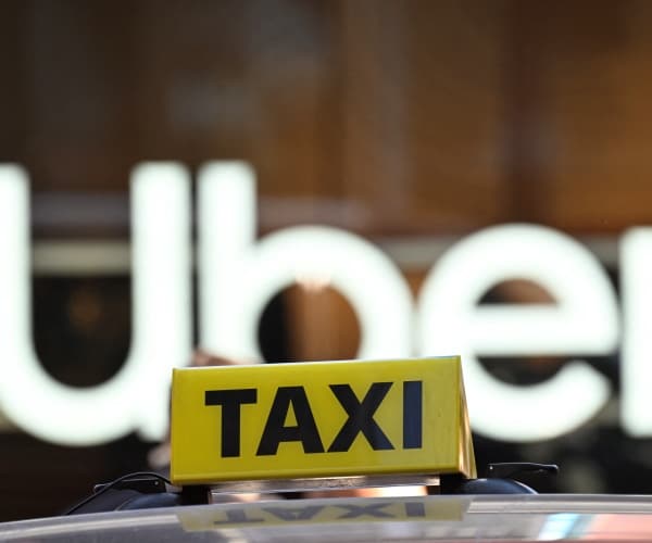 Uber Commits $10 Billion to Robotaxis in Strategy Shift
