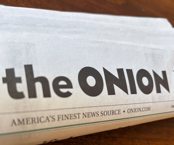 The Onion's Bid for Infowars Faces New Legal Battles