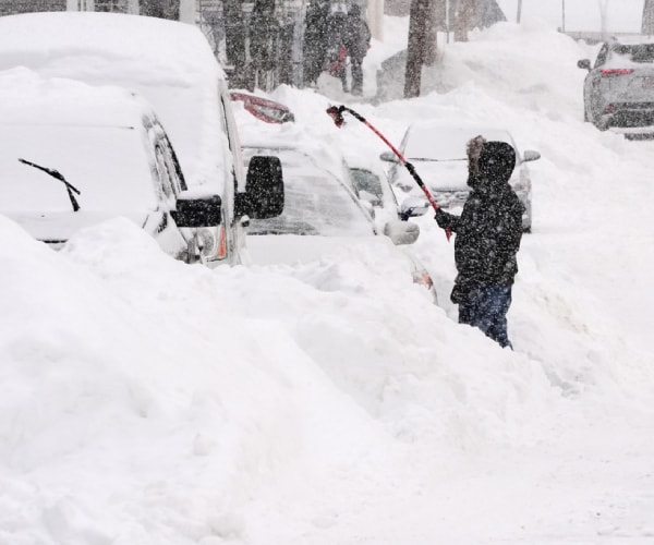 Paralyzing Winter Storms Put Big Chill on US Economy
