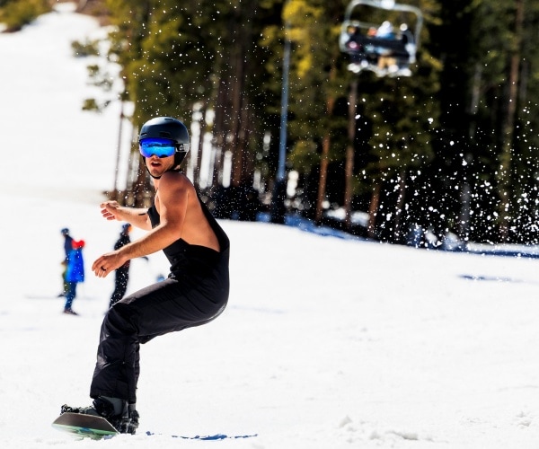 In Record Heat, US Ski Resorts Bulldoze Snow, Skiers Wear Bikinis