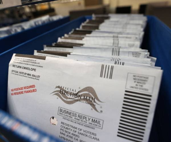 Democrats Sue to Block Trump Mail Voting Order