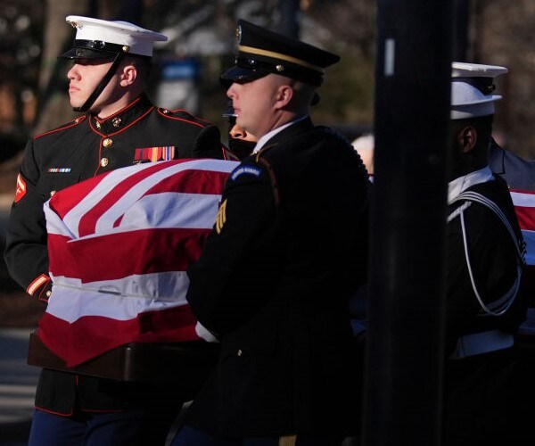 Carter's Casket Arrives at Capitol, Where He Will Lie in State