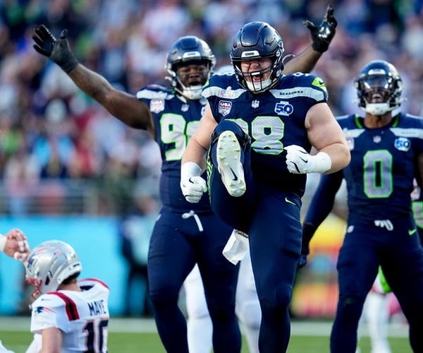 Seahawks Ride Their 'Dark Side' Defense to a Super Bowl Title, Pounding the Patriots 29-13