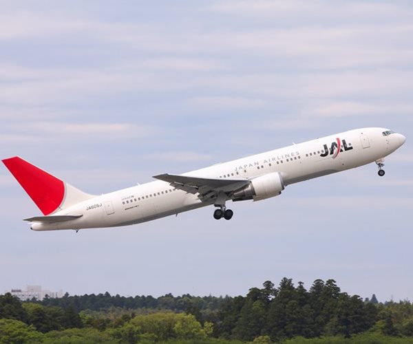 Japan Airlines Jet Wing Strikes Delta Tail on Ground in Seattle
