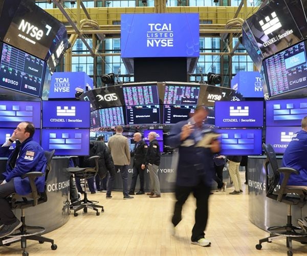 Dow Ends at Record, Chip Stocks Jump on AI Buzz