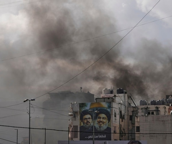 US Strikes a City Home to Iranian Nuclear Site While Tehran Hits Oil Tanker off Dubai Coast