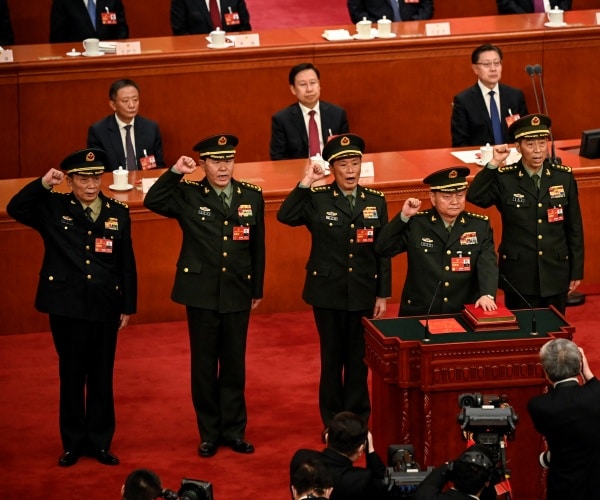 China's Xi Purges Almost Entire Military Command