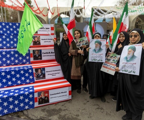 Iran Marks Revolution by Parading Coffins of US Commanders