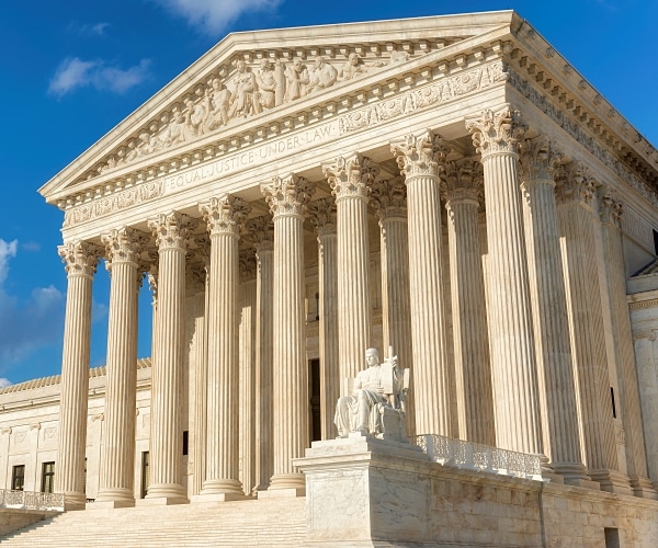 High Court Appears Split on Deportation Protections