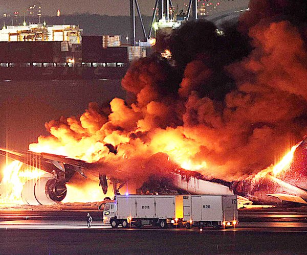 Japan Plane Bursts Into Flames After Landing Collision With Smaller Aircraft